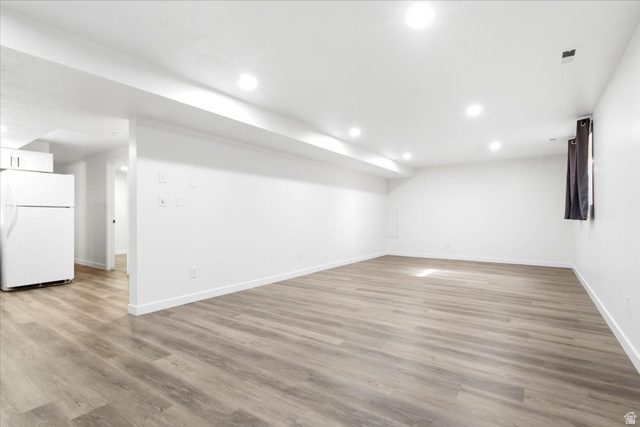 1676 East 11245 South Sandy, UT 84092 - Photo 23 of 34 Spacious interior with wood-finish flooring, recessed lighting, white walls, and white trim