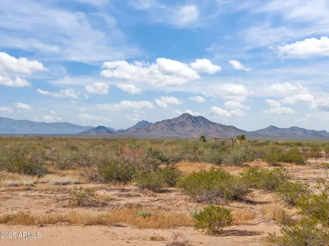 an aerial view of residential building and ocean