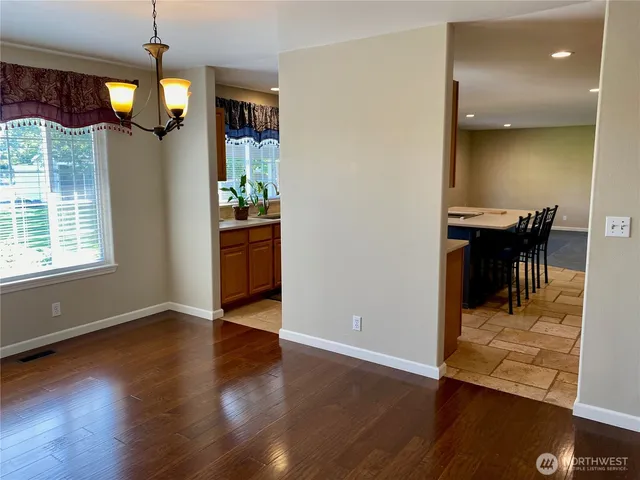 view of hallway with seating area