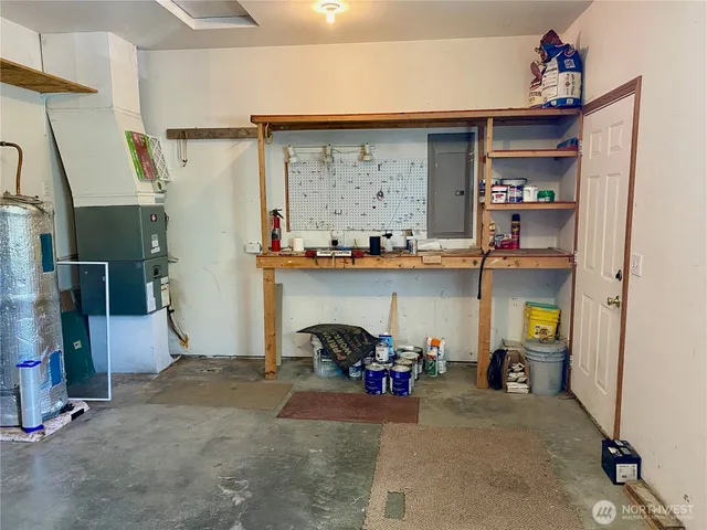 a yard with lots of green space and trees in the back