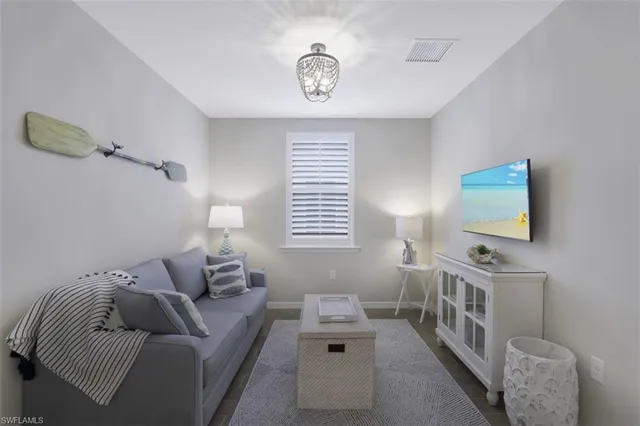 a bathroom with a sink and cabinets