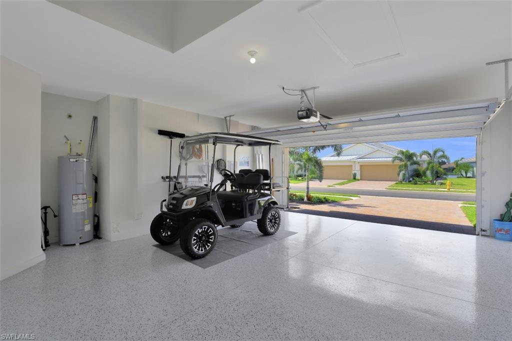14663 Edgewater Circle Naples, FL 34114 - Photo 20 of 35 a view of a room with gym equipment