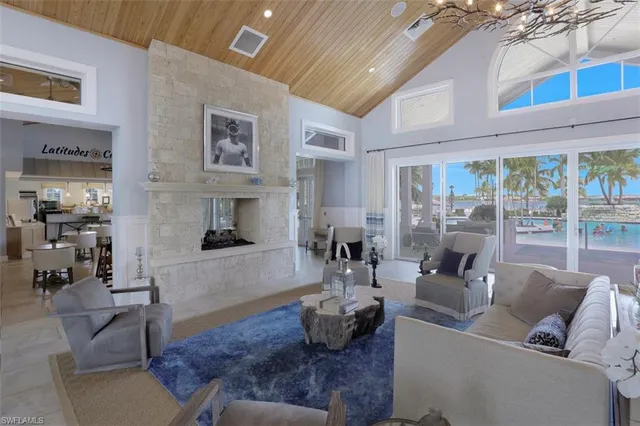 a view of a lake with a table and chairs