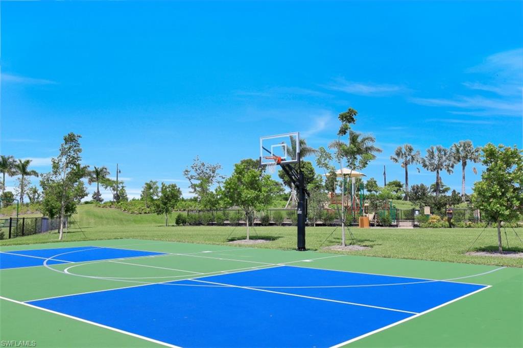 14663 Edgewater Circle Naples, FL 34114 - Photo 34 of 35 a view of a tennis court