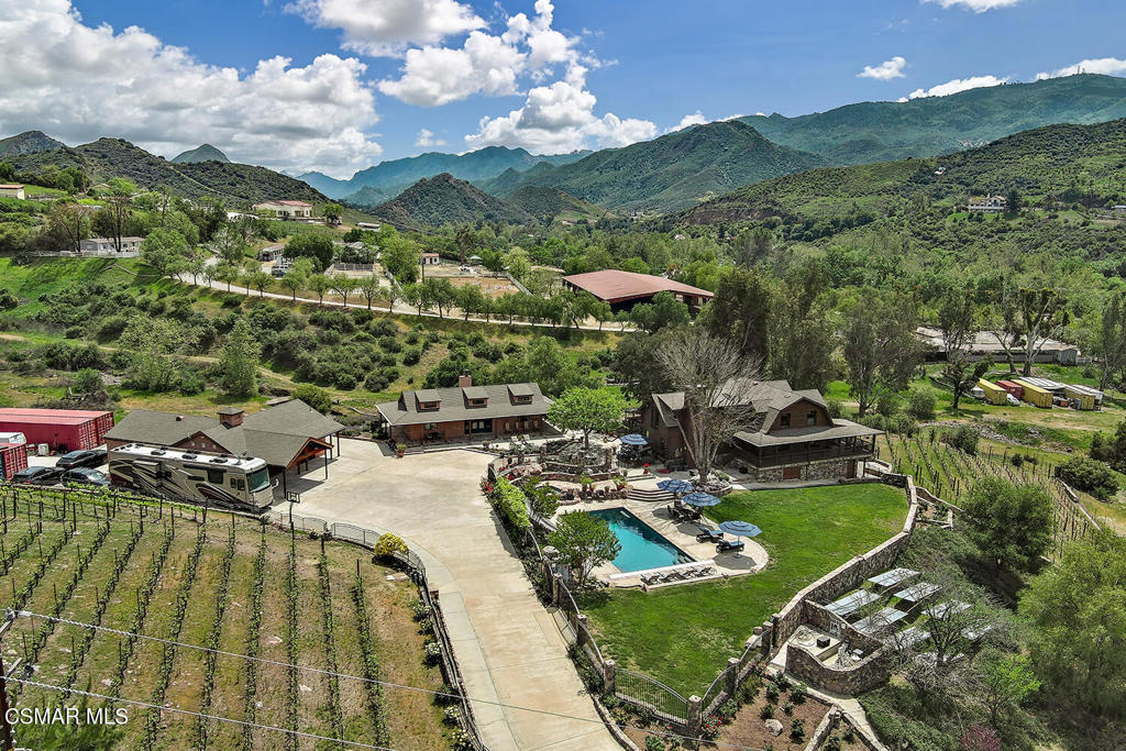 3030 Triunfo Canyon Road Agoura Hills, CA 91301 - Photo 3 of 50 a view of a lake with a mountain