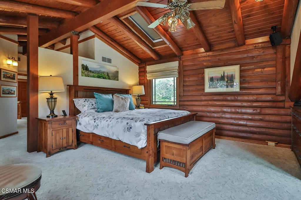 3030 Triunfo Canyon Road Agoura Hills, CA 91301 - Photo 33 of 50 a bed sitting in a room next to a building