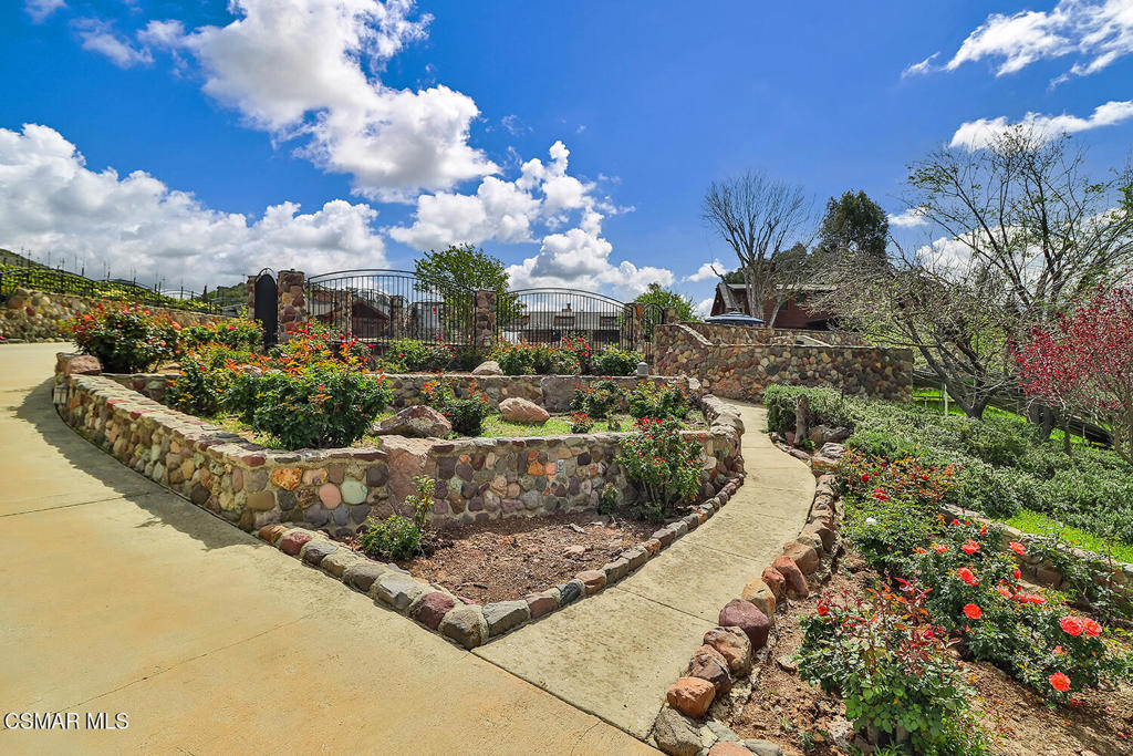 3030 Triunfo Canyon Road Agoura Hills, CA 91301 - Photo 5 of 50 a view of a yard with flower plants