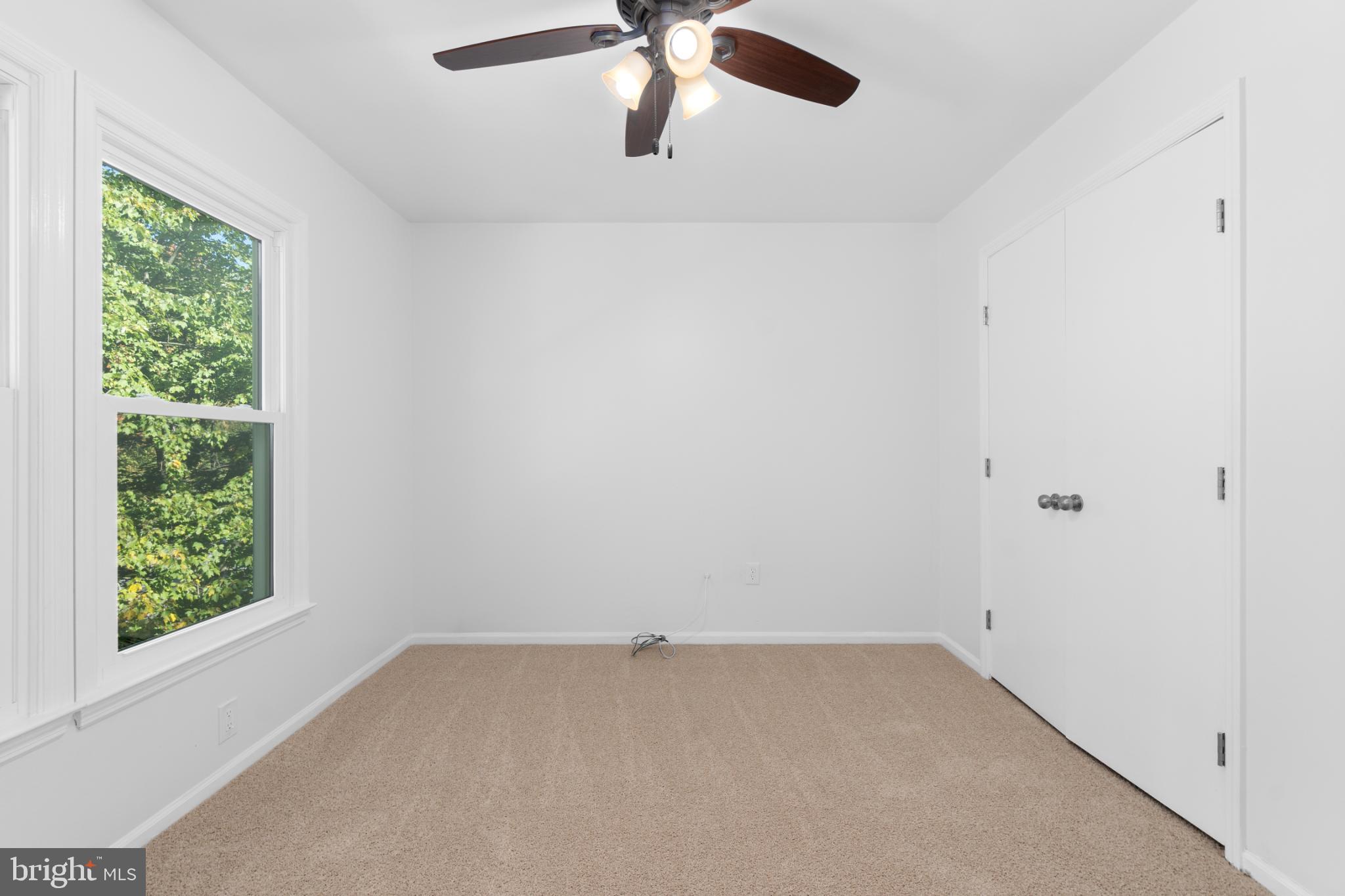 9079 Manorwood Road Laurel, MD 20723 - Photo 16 of 35 an empty room with a window