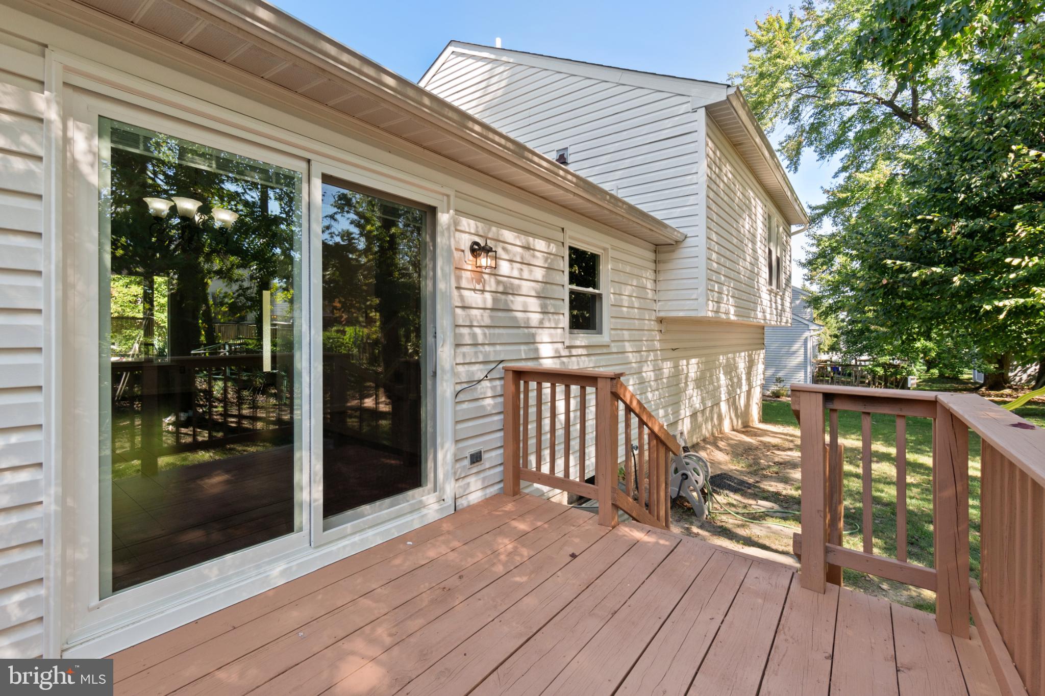 9079 Manorwood Road Laurel, MD 20723 - Photo 31 of 35 a view of a balcony with wooden floor