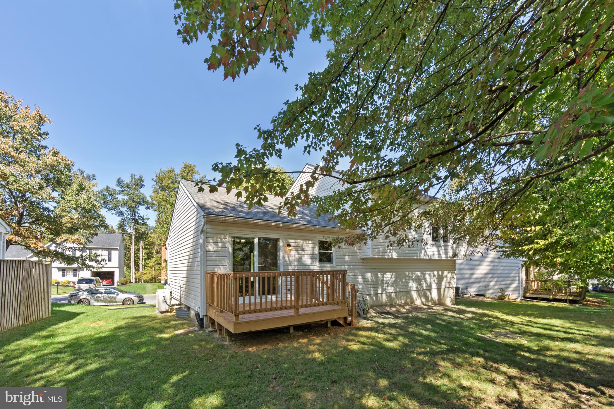 9079 Manorwood Road Laurel, MD 20723 - Photo 33 of 35 a view of a house with a yard