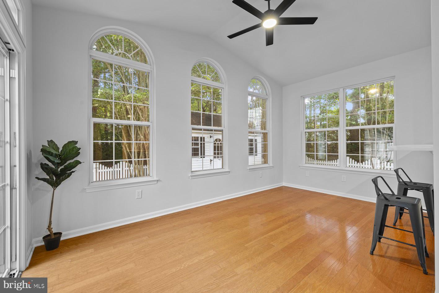 1111 Ruddy Duck Court Denton, MD 21629 - Photo 16 of 48 a view of a livingroom with a window and wooden floor
