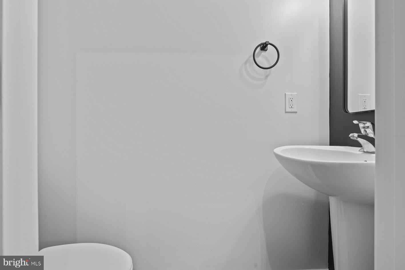 1111 Ruddy Duck Court Denton, MD 21629 - Photo 18 of 48 a bathroom with a sink and a mirror