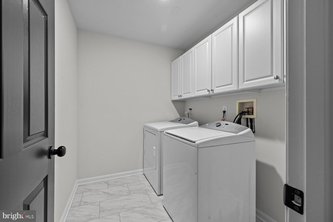 1111 Ruddy Duck Court Denton, MD 21629 - Photo 20 of 48 a utility room with dryer and washer