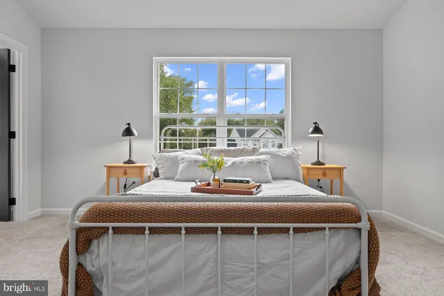 a dining room with a table and chairs