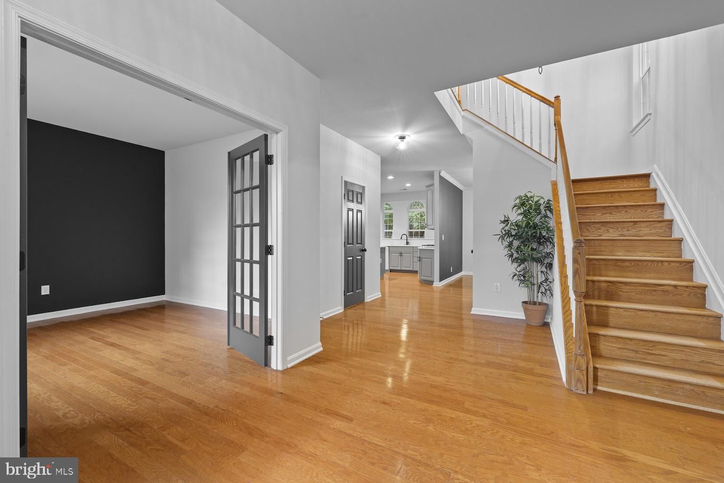 1111 Ruddy Duck Court Denton, MD 21629 - Photo 3 of 48 a view of livingroom and dining room with wooden floor