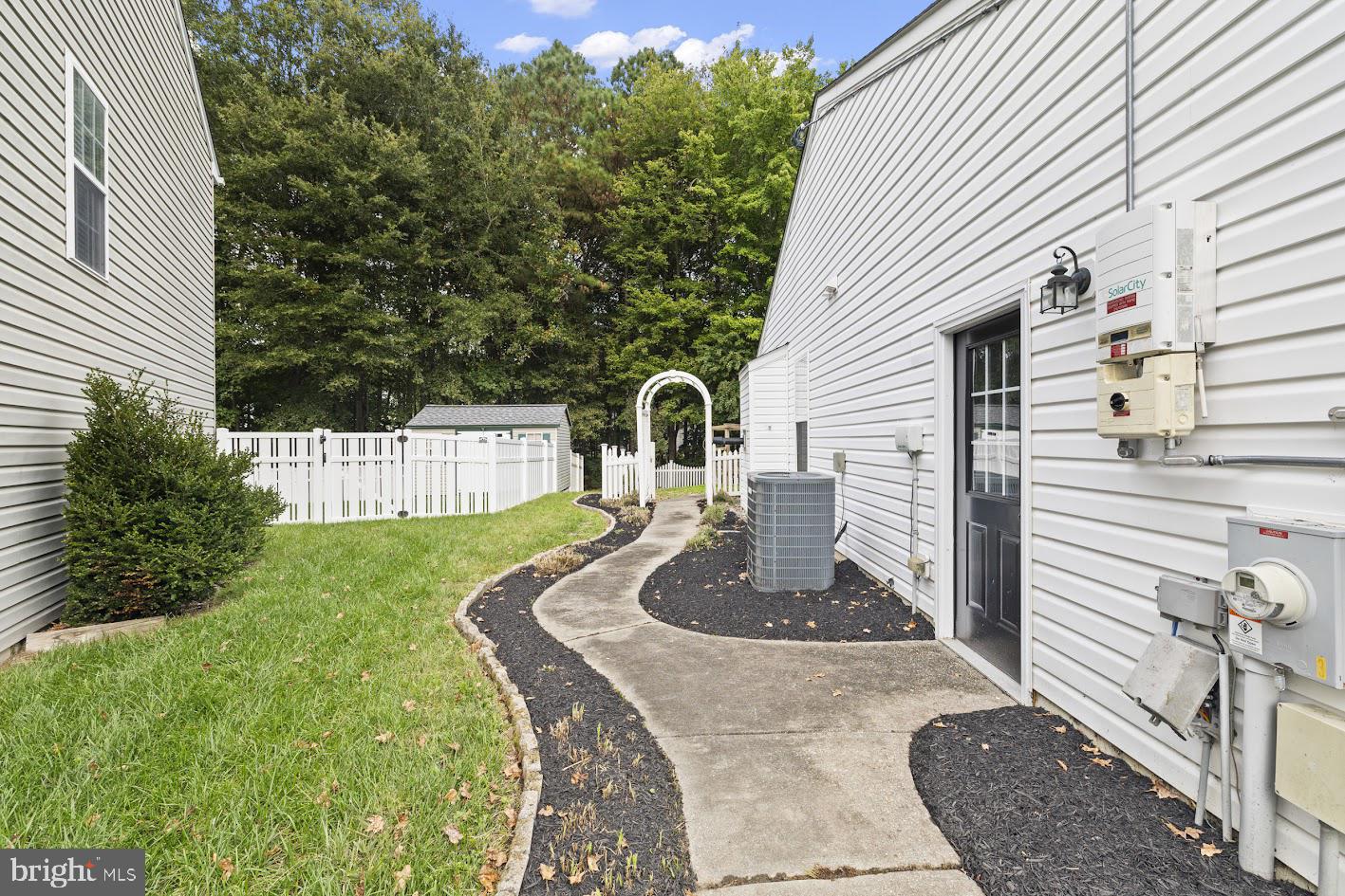 1111 Ruddy Duck Court Denton, MD 21629 - Photo 42 of 48 a front view of a house with garden