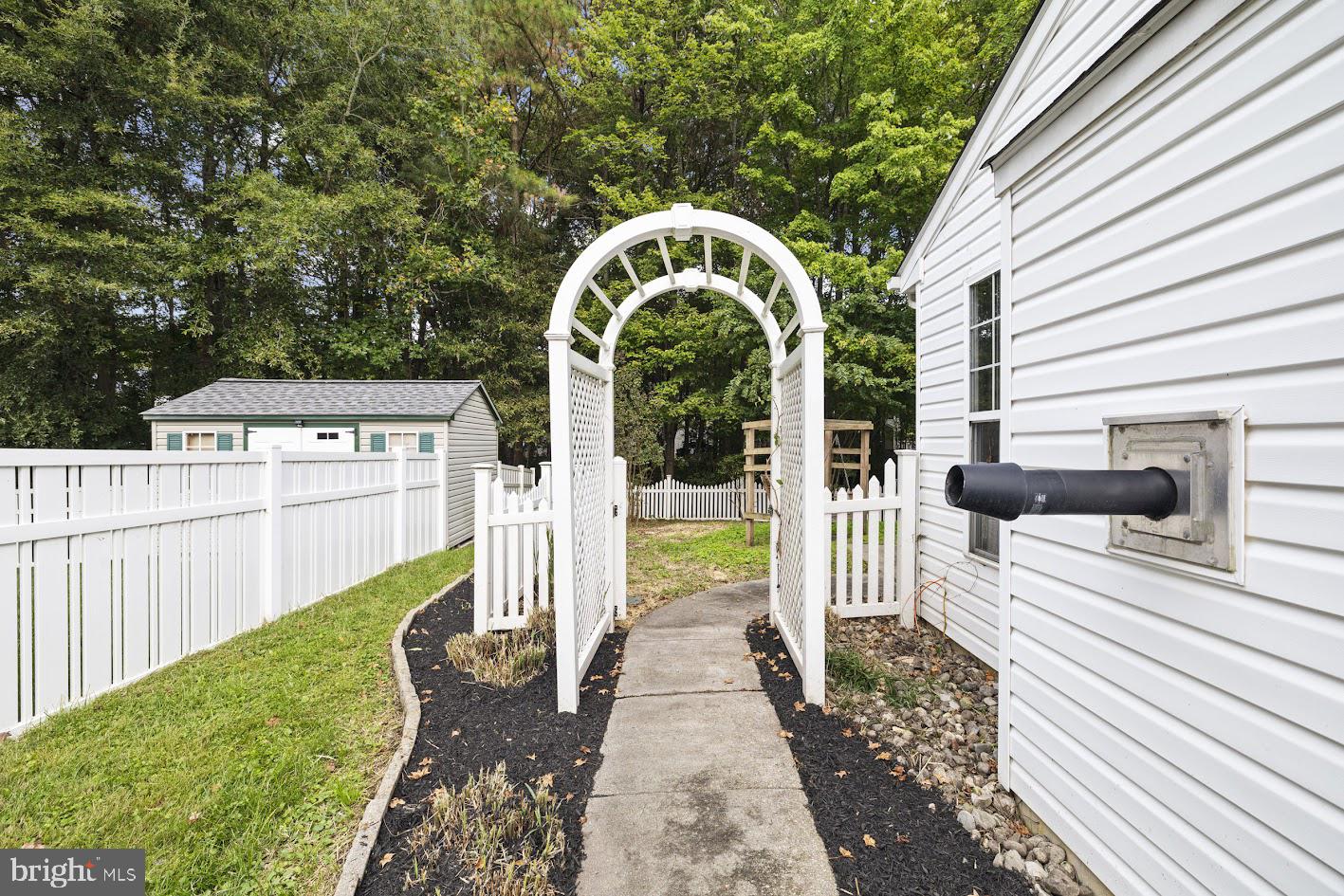 1111 Ruddy Duck Court Denton, MD 21629 - Photo 43 of 48 a view of a wooden deck with a backyard