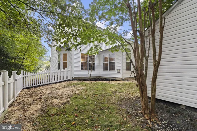 a house with trees in front of it