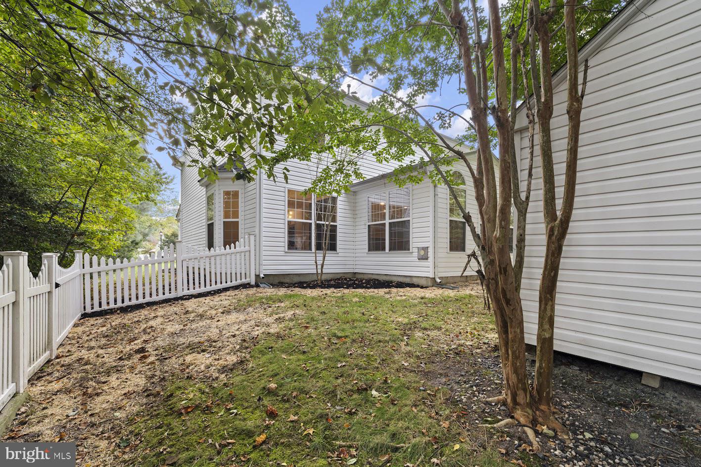 1111 Ruddy Duck Court Denton, MD 21629 - Photo 46 of 48 a house with trees in front of it