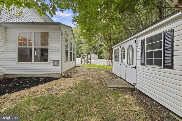 a house with trees in front of it
