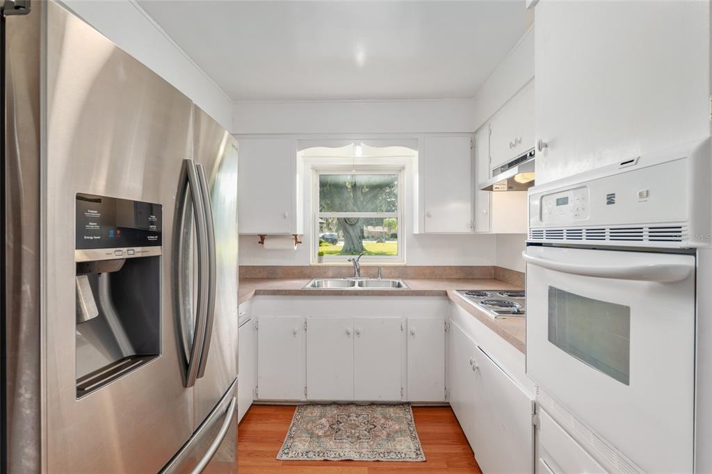 3430 Southwest 27th Street Ocala, FL 34474 - Photo 20 of 53 a kitchen with a refrigerator sink and stove