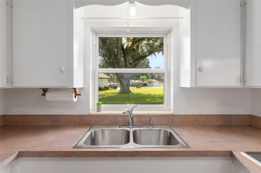 3430 Southwest 27th Street Ocala, FL 34474 - Photo 22 of 53 a kitchen with a sink and cabinet