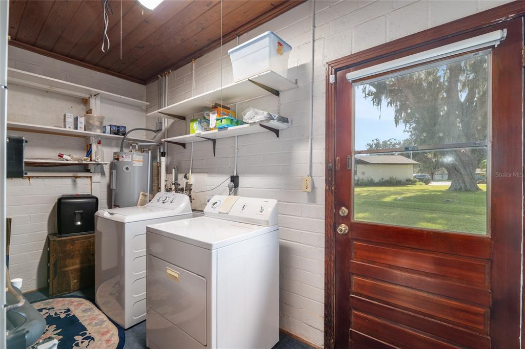 3430 Southwest 27th Street Ocala, FL 34474 - Photo 39 of 53 a kitchen with a sink and a refrigerator