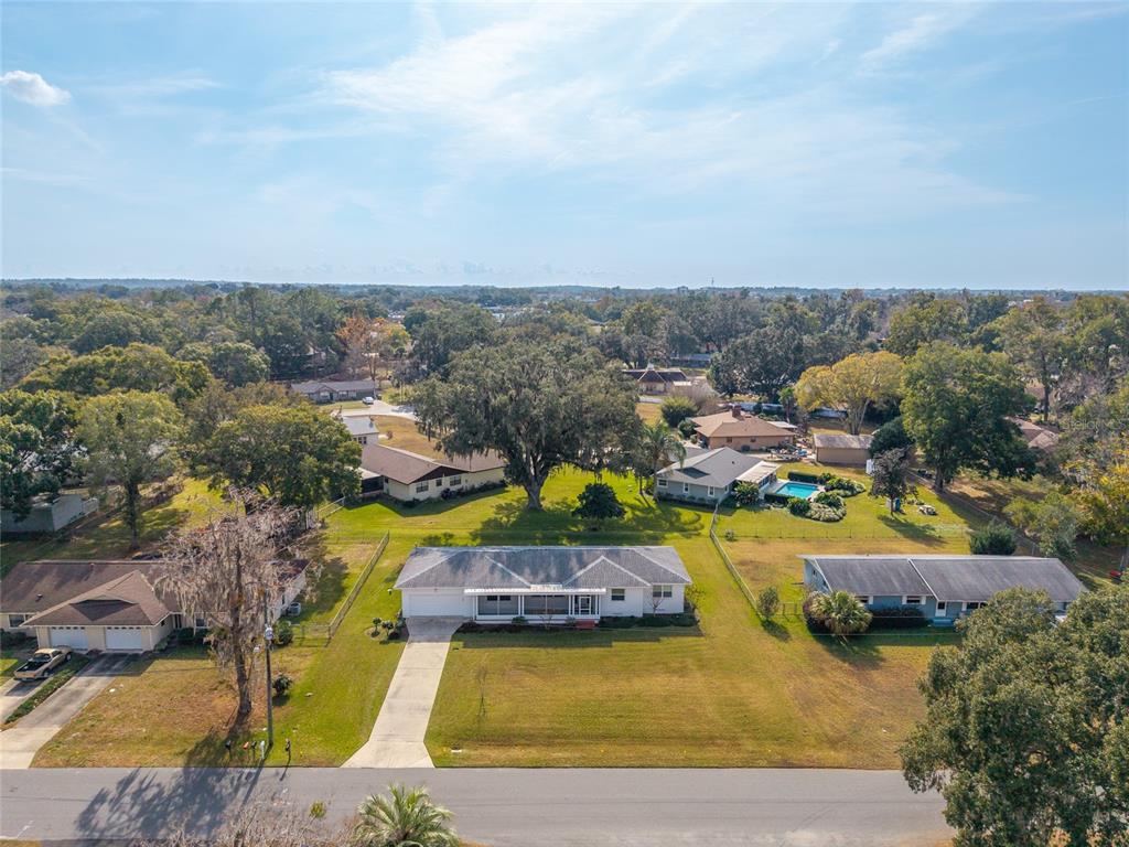 3430 Southwest 27th Street Ocala, FL 34474 - Photo 49 of 53 an aerial view of a house with a swimming pool yard and outdoor seating