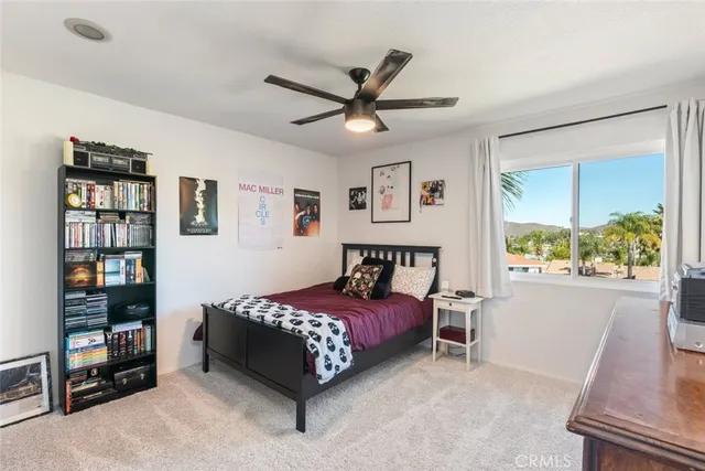 a view of a chair and table on the deck