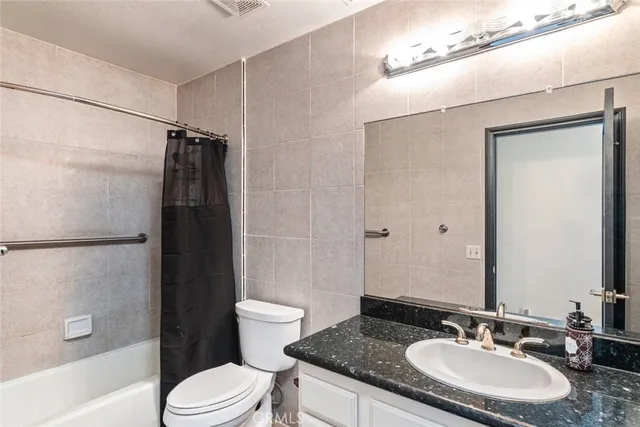 a view of a backyard with a patio