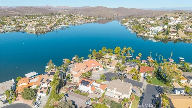 a view of a park with large trees