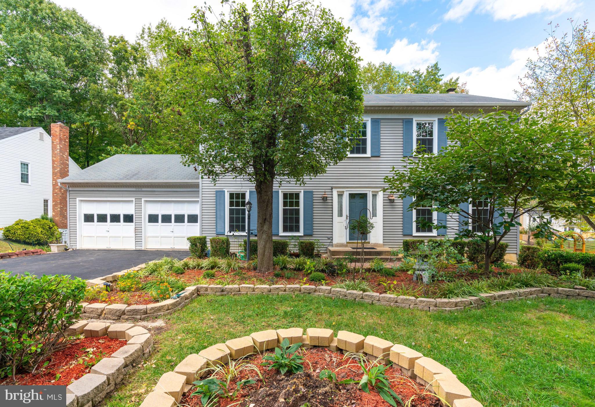 13003 Smoketown Road Woodbridge, VA 22192 - Photo 1 of 34 Front of Home with Beautiful Landscaping