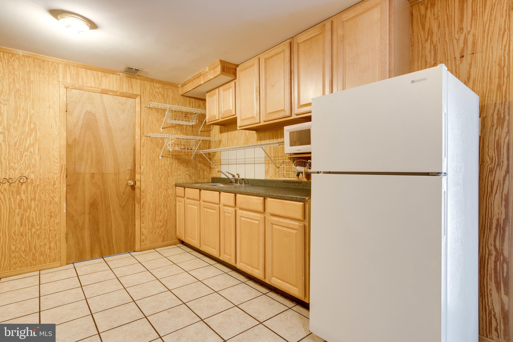 13003 Smoketown Road Woodbridge, VA 22192 - Photo 26 of 34 Small Kitchen Area in Basement