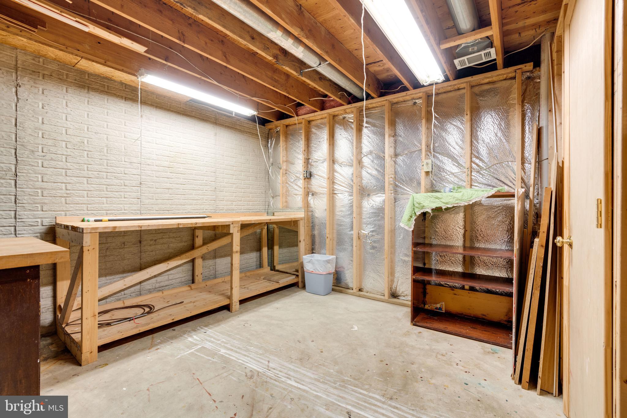 13003 Smoketown Road Woodbridge, VA 22192 - Photo 27 of 34 Workshop with Bench