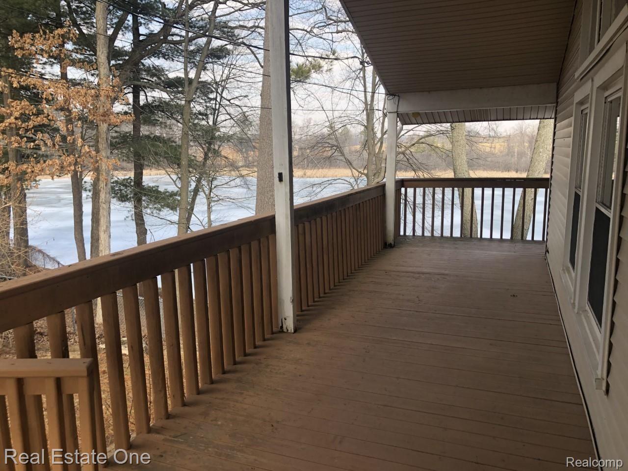 944 Pine Tree Road West Lake Orion, MI 48362 - Photo 23 of 81 '25' x 8' wrap around deck (2nd floor)