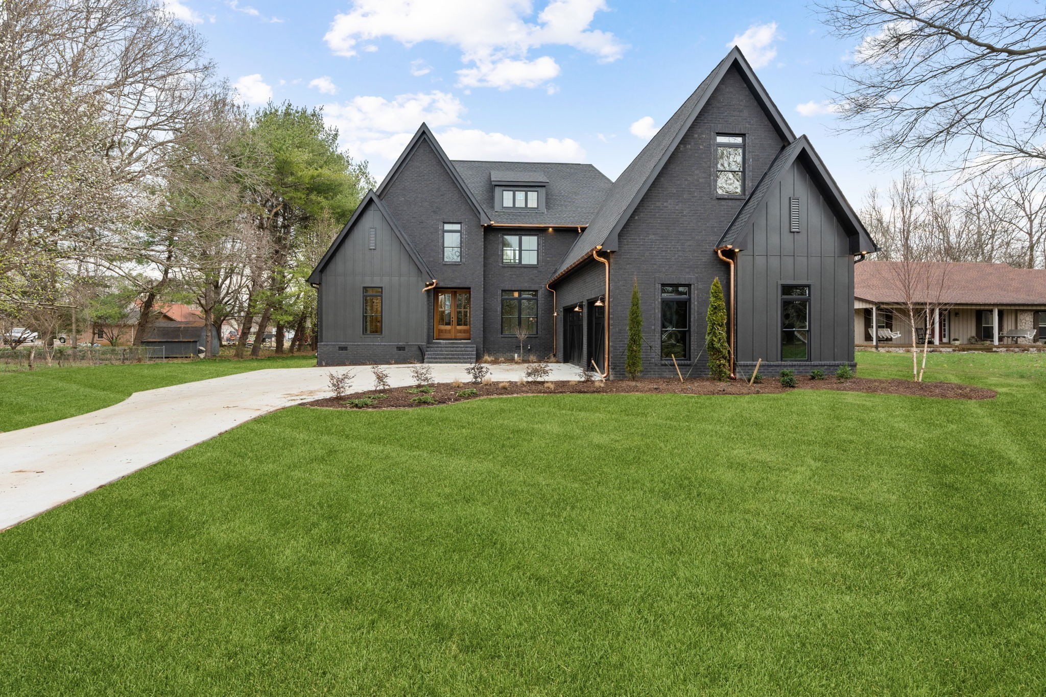1017 Rucker Lane Murfreesboro, TN 37128 - Photo 2 of 61 a front view of house with yard and green space