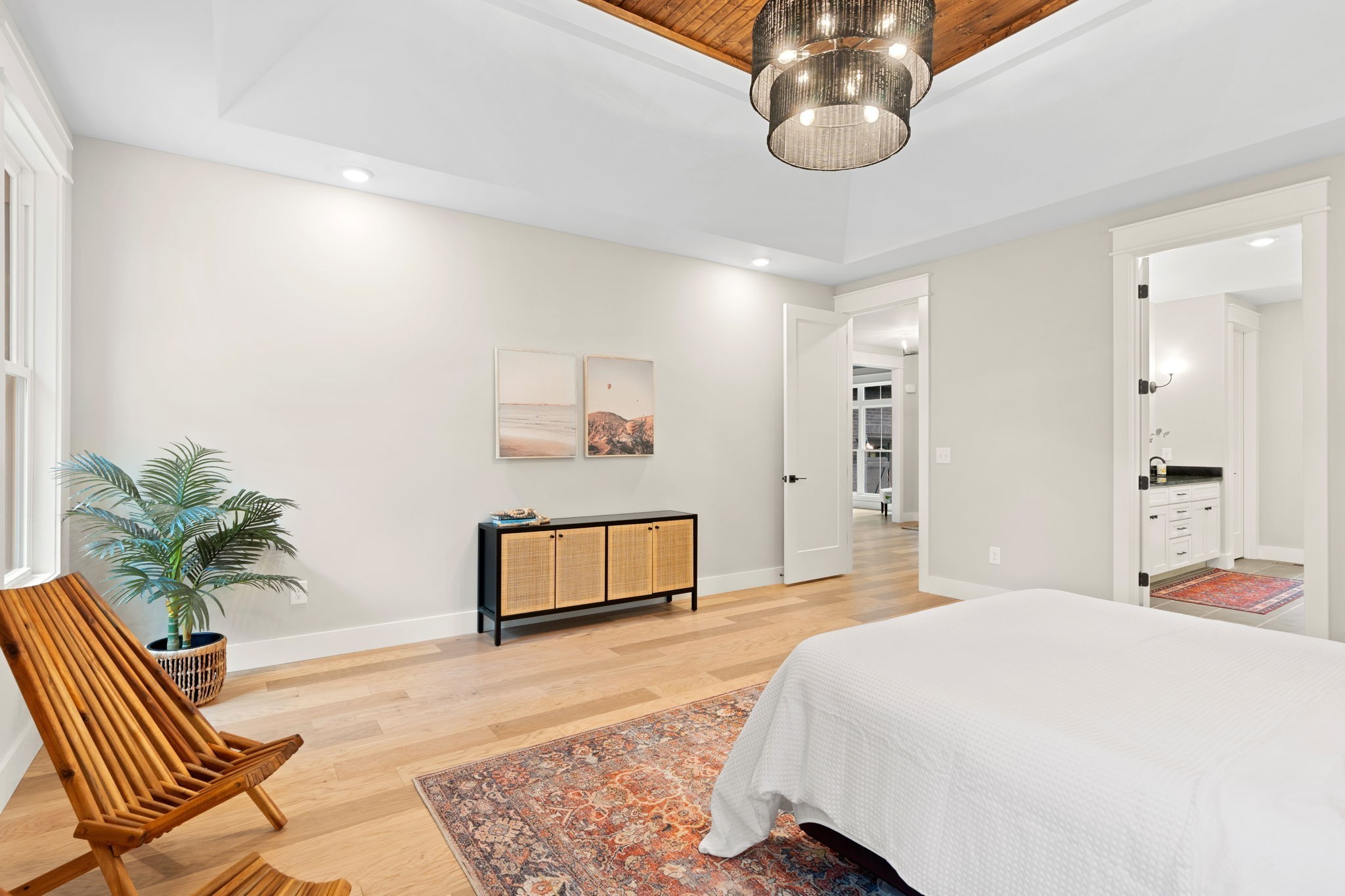 1017 Rucker Lane Murfreesboro, TN 37128 - Photo 26 of 61 a bedroom with a large bed and a chandelier