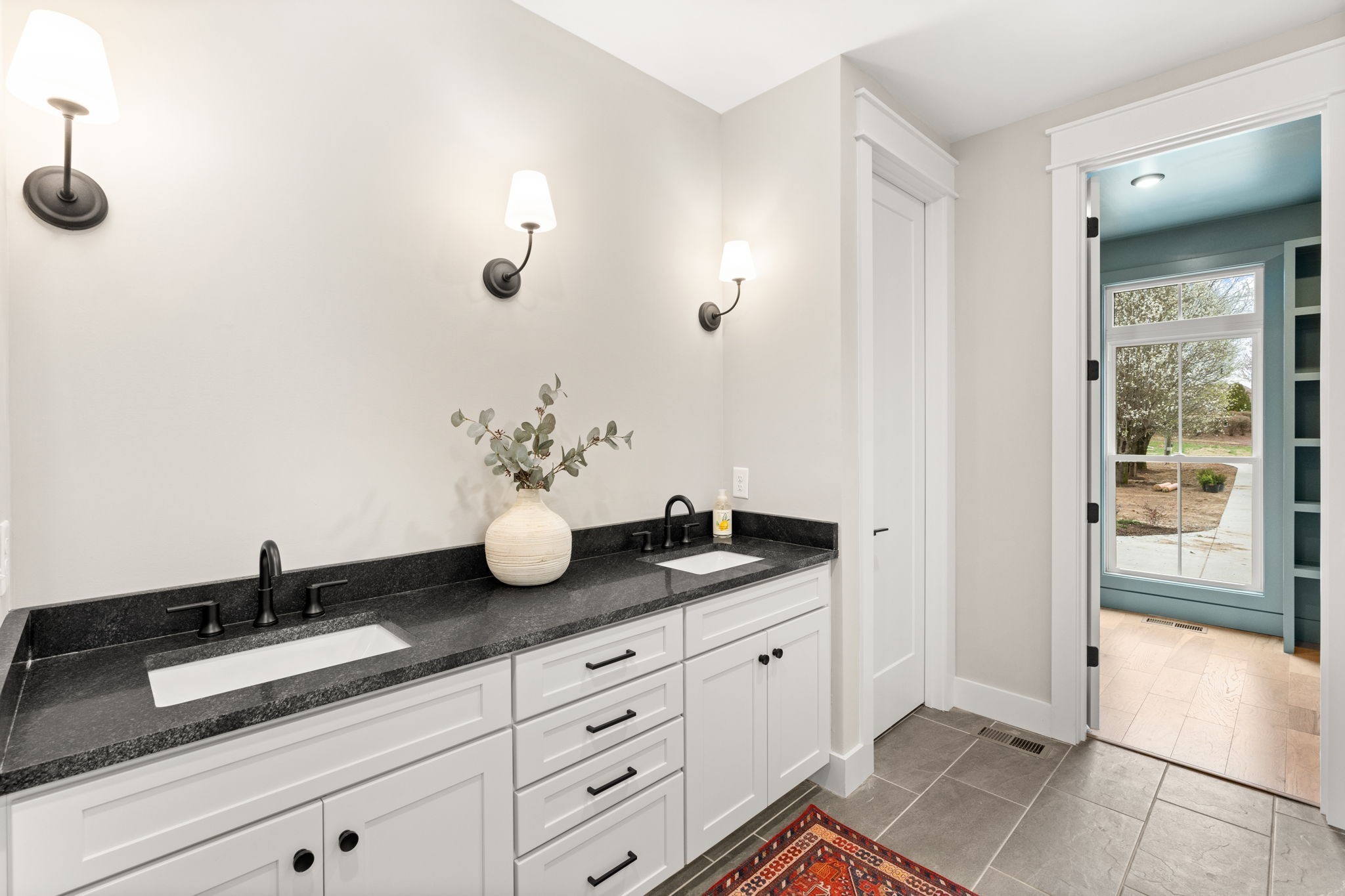 1017 Rucker Lane Murfreesboro, TN 37128 - Photo 29 of 61 a bathroom with a granite countertop sink and a mirror