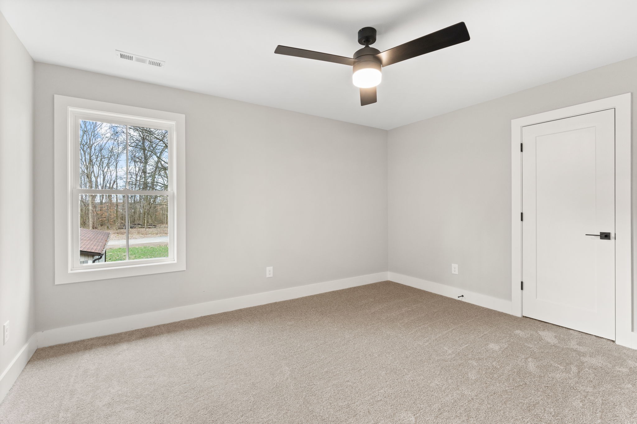 1017 Rucker Lane Murfreesboro, TN 37128 - Photo 44 of 61 an empty room with ceiling fan and windows