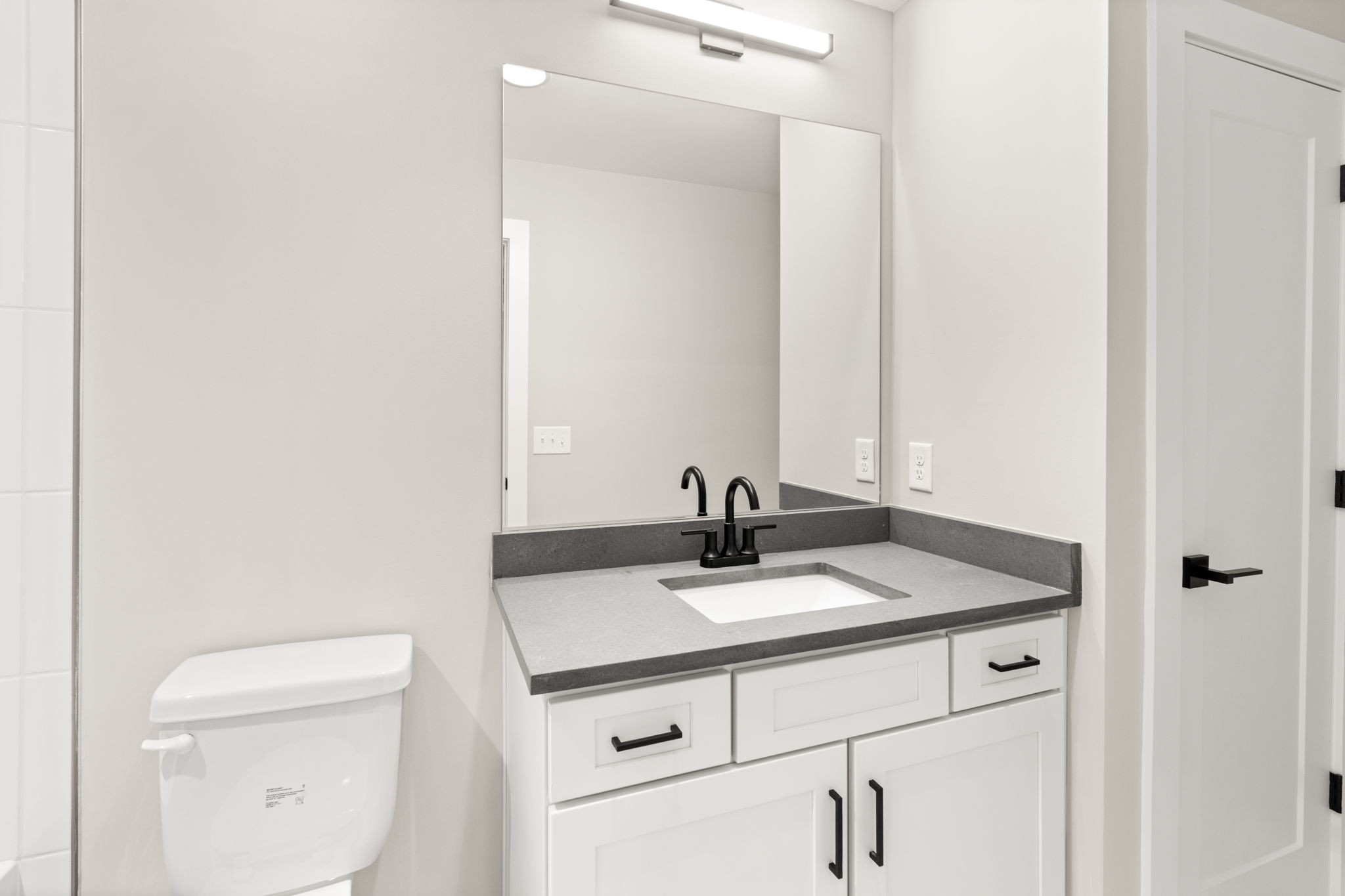 1017 Rucker Lane Murfreesboro, TN 37128 - Photo 46 of 61 a close view of a sink and a vanity in bathroom