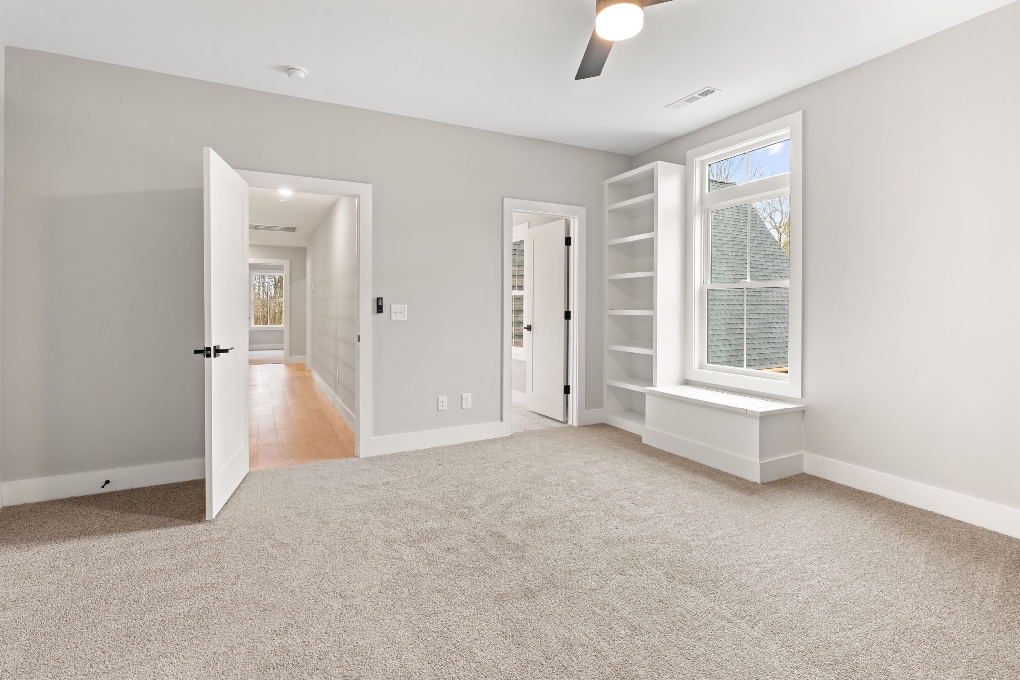 1017 Rucker Lane Murfreesboro, TN 37128 - Photo 48 of 61 an empty room with chandelier fan and windows