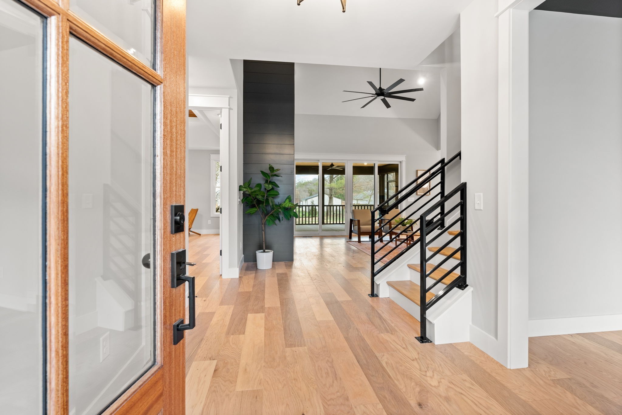 1017 Rucker Lane Murfreesboro, TN 37128 - Photo 5 of 61 a hallway with wooden floor chandelier and entryway