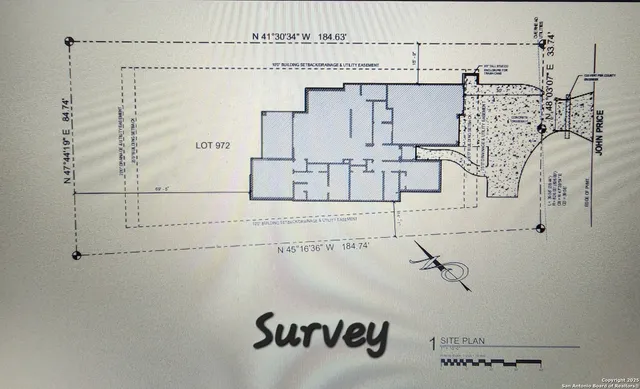 a view of a hallway with staircase