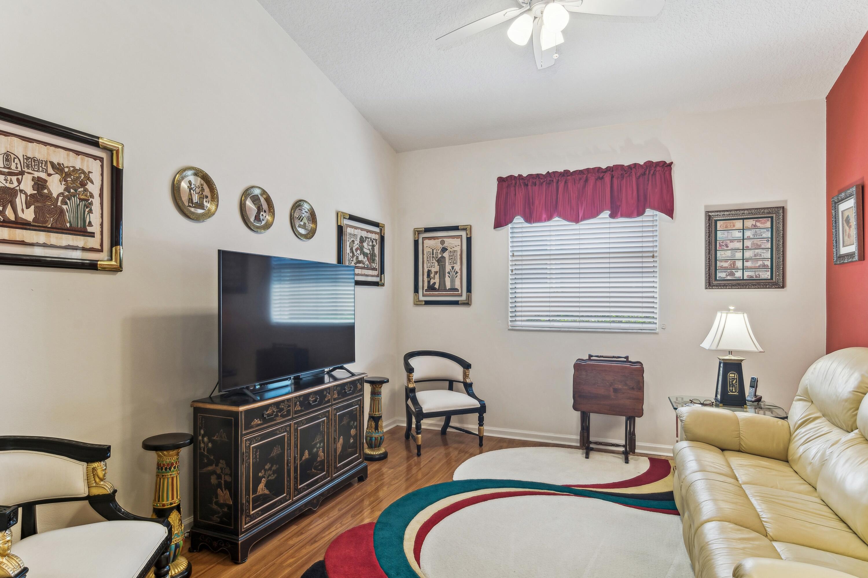 351 Springview Loop Port St. Lucie, FL 34986 - Photo 9 of 52 09_351NWSpringviewLoop_53_Den_HiRes