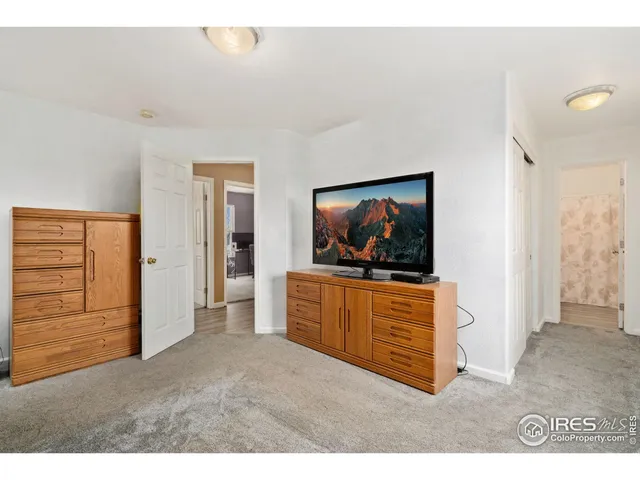 a bathroom with a sink toilet and a mirror