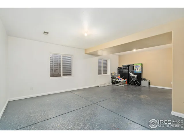 a bathroom with a sink toilet and a mirror