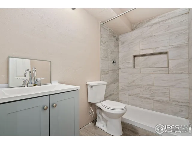 a bathroom with a sink and a yard