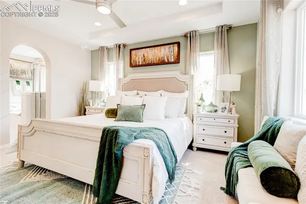 a bed room with a bed and a window
