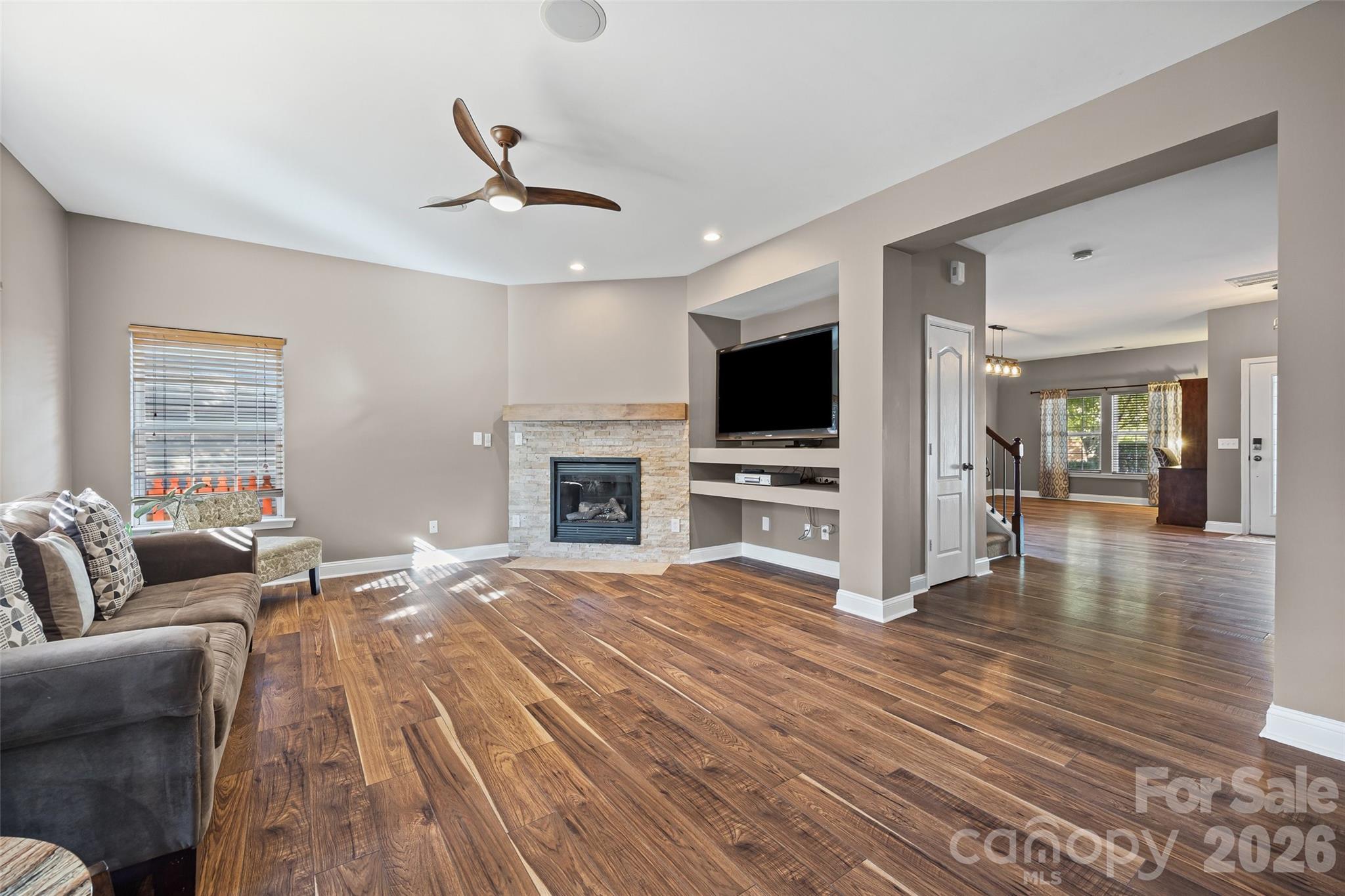240 Loch Stone Street Fort Mill, SC 29715 - Photo 11 of 45 a living room with furniture and a fireplace