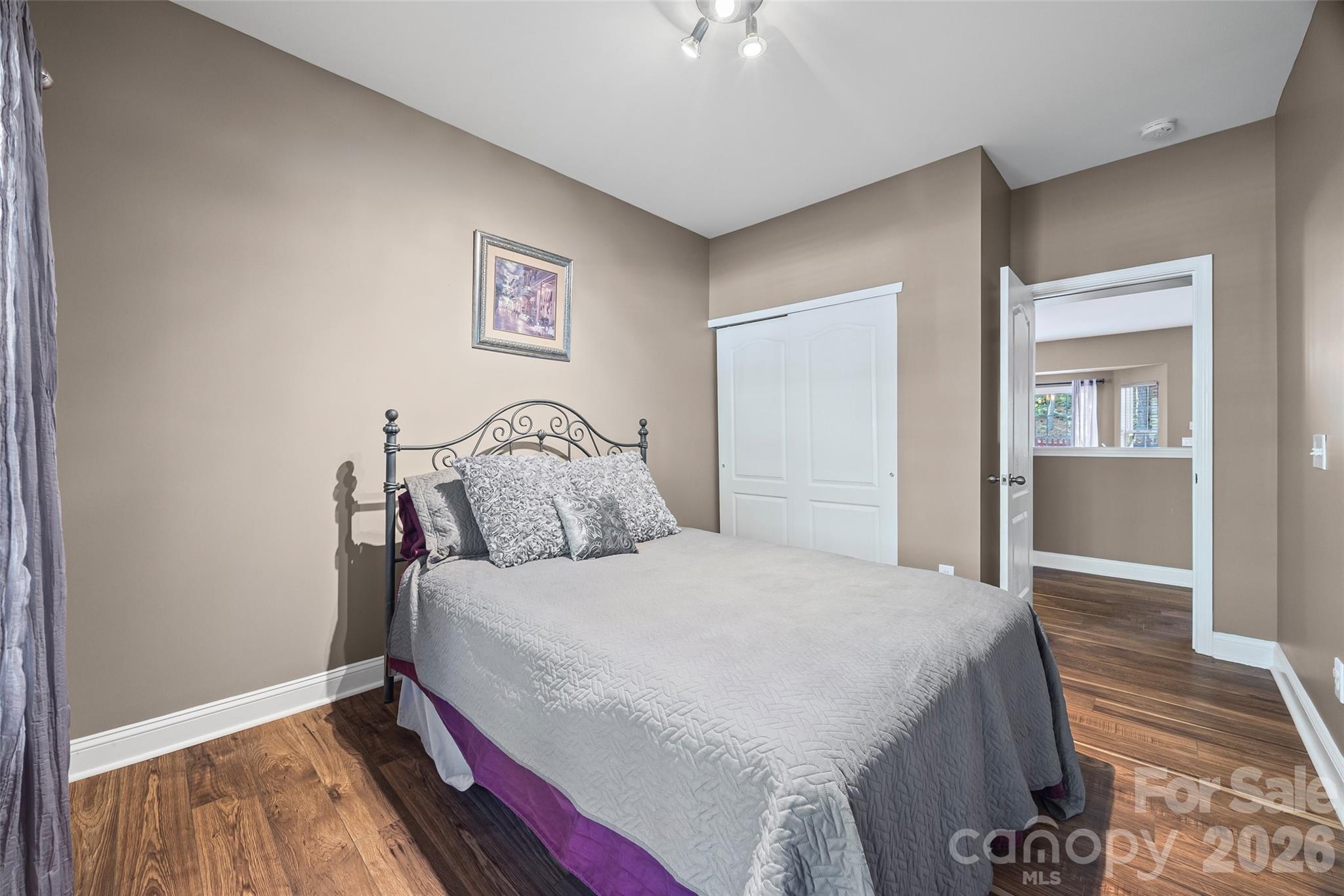 240 Loch Stone Street Fort Mill, SC 29715 - Photo 25 of 45 a bedroom with a bed and a view of bathroom